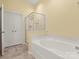 Serene bathroom featuring a large tub and a separate glass-enclosed shower at 1219 Crown Vista Dr, Fort Mill, SC 29707