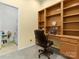 Inviting home office with built-in desk and shelves for productive work or study at 1219 Crown Vista Dr, Fort Mill, SC 29707