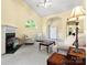 Inviting living room with a fireplace, comfortable seating, and plenty of natural light at 1219 Crown Vista Dr, Fort Mill, SC 29707