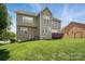 Expansive backyard featuring well-maintained lawn and deck, perfect for outdoor enjoyment at 126 W Warfield Dr, Mooresville, NC 28115