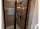 This bathroom offers a glass enclosed tiled shower with a rain shower head at 126 W Warfield Dr, Mooresville, NC 28115