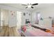 Charming ' bedroom with fun wall decor, wood-look floors, and comfortable bed at 126 W Warfield Dr, Mooresville, NC 28115