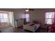 Bedroom features natural light from the bright windows and wood flooring at 126 W Warfield Dr, Mooresville, NC 28115