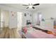 Charming ' bedroom with fun wall decor, wood-look floors, and comfortable bed at 126 W Warfield Dr, Mooresville, NC 28115