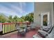 Inviting deck with ample seating surrounded by lush greenery at 126 W Warfield Dr, Mooresville, NC 28115