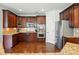 Gourmet kitchen with custom cabinetry, stainless steel appliances, and granite countertops at 126 W Warfield Dr, Mooresville, NC 28115