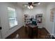 Cozy office space with built-in bookshelves and a ceiling fan at 126 W Warfield Dr, Mooresville, NC 28115