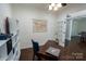 Bright office with built-in shelves, providing ample storage and display space at 126 W Warfield Dr, Mooresville, NC 28115