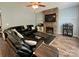 Comfortable living room with stone fireplace and stylish decor at 13241 Woodland Farm Dr, Charlotte, NC 28215