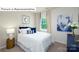 Comfortable bedroom with neutral tones, a plush bed, and a window providing natural light at 1365 Secrest Commons Dr, Monroe, NC 28112