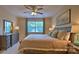 Comfortable main bedroom featuring carpet, a large window, and neutral colored walls at 141 Way Cross Ln, Troutman, NC 28166