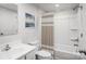 Clean bathroom featuring a shower over tub and contemporary sink at 1430 Samuel St, Charlotte, NC 28206