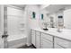 Elegant bathroom with double vanity, shower and tub, and modern fixtures at 1430 Samuel St, Charlotte, NC 28206