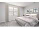 Serene bedroom with soft bedding, large window, and tasteful decor at 1430 Samuel St, Charlotte, NC 28206