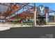 Outdoor venue with a covered seating area, dining options and modern architectural design at 1430 Samuel St, Charlotte, NC 28206