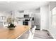 Modern kitchen with granite countertops, stainless appliances, and ample natural light at 1430 Samuel St, Charlotte, NC 28206