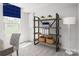 Bright office space with shelving and ample natural light at 1430 Samuel St, Charlotte, NC 28206