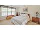 Cozy bedroom with neutral carpet, a large window, and classic furnishings at 14340 Kendalton Meadow Dr, Mint Hill, NC 28227