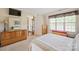 Bedroom with a dresser, natural light and soft carpet at 14340 Kendalton Meadow Dr, Mint Hill, NC 28227