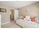 Comfortable bedroom with a view into the en-suite bathroom at 14340 Kendalton Meadow Dr, Mint Hill, NC 28227