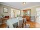 Formal dining room features hardwood floors, traditional decor and a large hutch at 14340 Kendalton Meadow Dr, Mint Hill, NC 28227