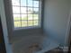 Bathroom with a tub, a large window with natural light and view at 149 Mason Tanner Ct, Rock Hill, SC 29730