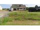 Charming single-Gathering home featuring a covered porch and attached garage, perfect for comfortable living at 149 Mason Tanner Ct, Rock Hill, SC 29730