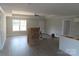Open concept living room featuring vinyl flooring, ceiling fan and a large window at 149 Mason Tanner Ct, Rock Hill, SC 29730