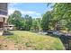 Expansive backyard leading to a private dock with boat access, perfect for lake living at 184 Quiet Cove Rd, Mooresville, NC 28117