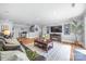 Spacious living room boasts hardwood floors, modern decor, and an open concept layout at 184 Quiet Cove Rd, Mooresville, NC 28117