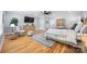 A bright main bedroom with hardwood floors, recessed lighting and TV at 184 Quiet Cove Rd, Mooresville, NC 28117