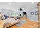 Spacious main bedroom with a ceiling fan, light blue walls, and a walk-in closet at 184 Quiet Cove Rd, Mooresville, NC 28117