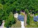 Aerial view of a charming home surrounded by lush greenery and a private yard at 1994 Hollybrook Ln # 17, Lancaster, SC 29720