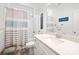 Clean, bright bathroom featuring a shower/tub combo, vanity with countertop, and neutral decor at 1994 Hollybrook Ln # 17, Lancaster, SC 29720