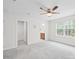 Bright bedroom with a ceiling fan, closet and a bathroom at 2012 Slippery Rock Ln, Monroe, NC 28112