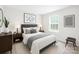 Cozy bedroom with stylish decor, featuring a comfortable bed and bedside tables for a modern retreat at 2012 Slippery Rock Ln, Monroe, NC 28112