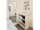 Bathroom featuring storage space with towels and a decorational mirror at 2025 Kisatchie Dr, Hickory Grove, SC 29717