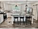 Bright, modern kitchen featuring a center island and stainless steel appliances at 2025 Kisatchie Dr, Hickory Grove, SC 29717