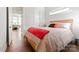 Bright bedroom has wood floors and a neutral color scheme at 2518 Marshall Pl, Charlotte, NC 28203