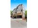 Modern townhome exterior featuring attached garages and a clean architectural design at 2518 Marshall Pl, Charlotte, NC 28203