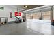 Spacious garage featuring an epoxy floor, overhead door, and ample natural light, great for storage at 2518 Marshall Pl, Charlotte, NC 28203
