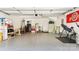 Spacious two-car garage with epoxy flooring, ample storage, and an organization system at 2518 Marshall Pl, Charlotte, NC 28203