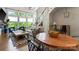 Living room with many windows, an animal print rug, a staircase and comfortable furniture at 2518 Marshall Pl, Charlotte, NC 28203