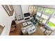 Open-concept living room with modern lighting, high ceilings, and large windows, offering a bright and airy feel at 2518 Marshall Pl, Charlotte, NC 28203