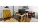 Home office showcasing classic furnishings, artwork, and hardwood floors at 2518 Marshall Pl, Charlotte, NC 28203