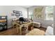 Well-lit home office featuring hardwood floors, neutral walls, and classic furnishing at 2518 Marshall Pl, Charlotte, NC 28203