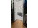 View from the walk-in closet looking into a neutral-toned bathroom at 2518 Marshall Pl, Charlotte, NC 28203