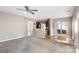 Large living area seamlessly blends carpeted and hardwood flooring at 2608 Yarrow Rd, Charlotte, NC 28213