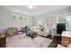 Inviting living space with bright natural light and adjacent work and play area at 2637 Springway Dr, Charlotte, NC 28205