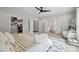 Spacious main bedroom with ensuite bathroom and closet, featuring a decorative rug and a ceiling fan at 2637 Springway Dr, Charlotte, NC 28205